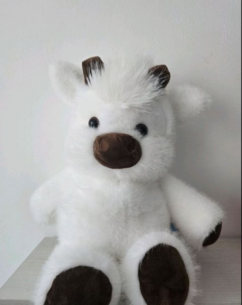 Інтерактивна м'яка іграшка "Бігаюче Телятко" (Running Cow Plush) Трендова Корівка М-1012 фото